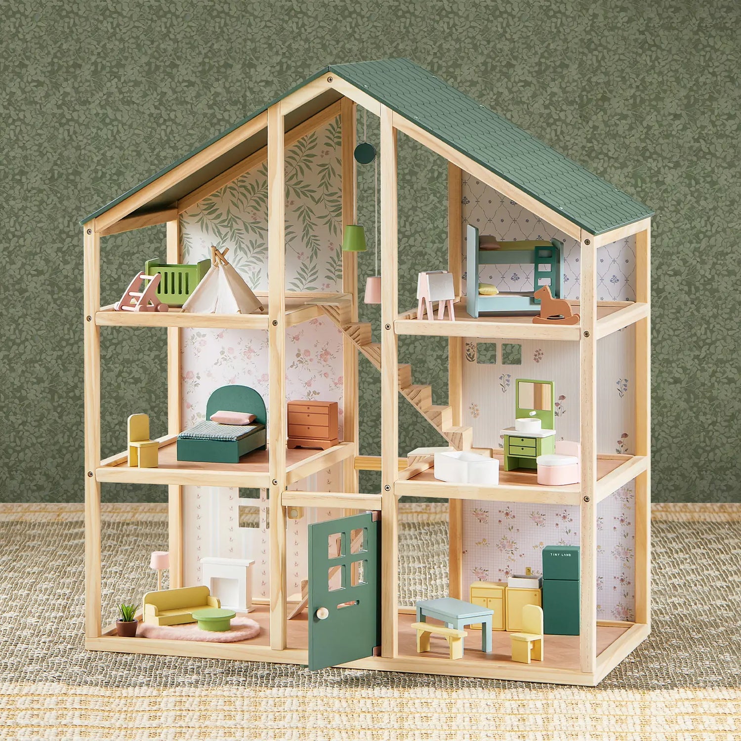 Wooden dollhouse showcasing various Pretend Play Toys for imaginative play and creativity.