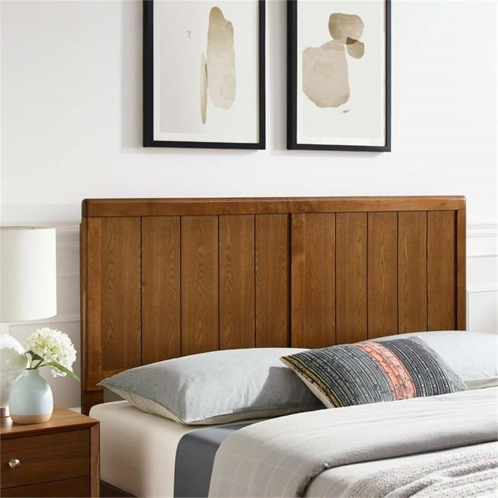 Elegant wooden headboard featuring a slatted design in a cozy bedroom setting.