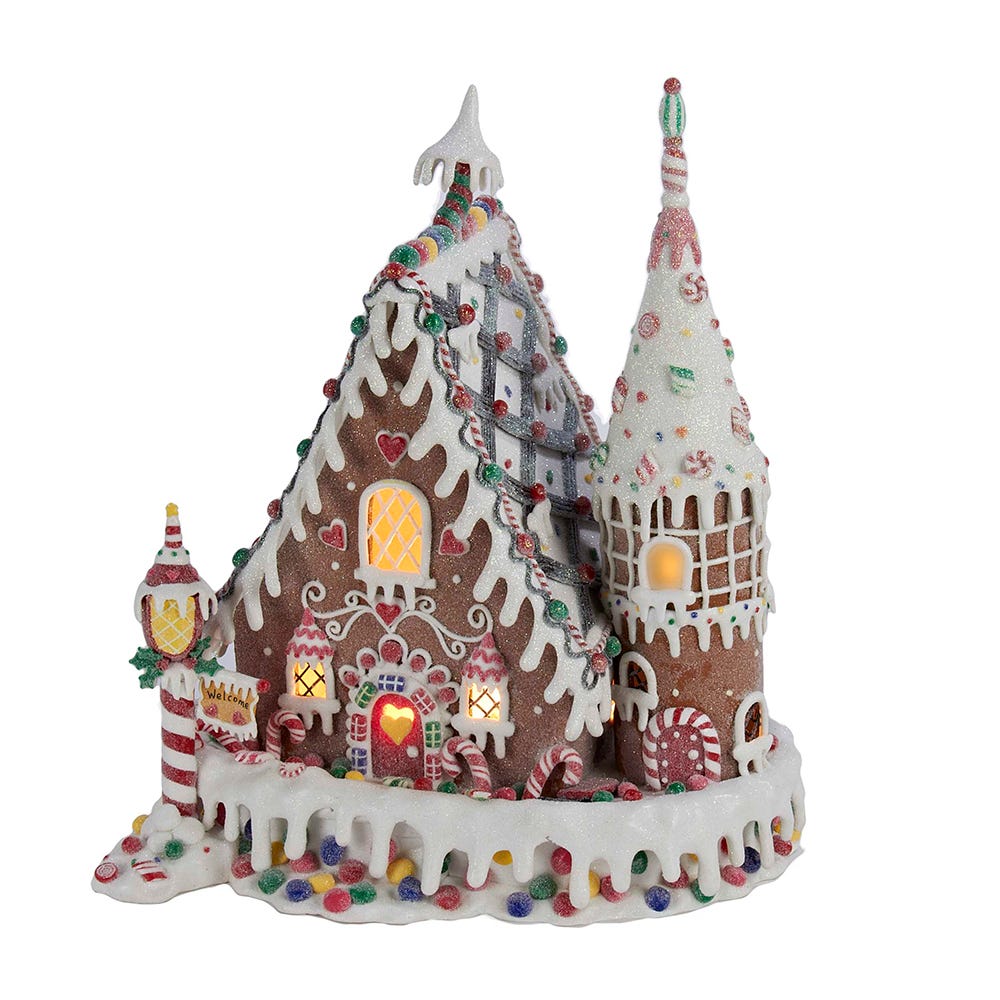 Gingerbread house decorated with colorful candies and icing, perfect for festive holiday decor.