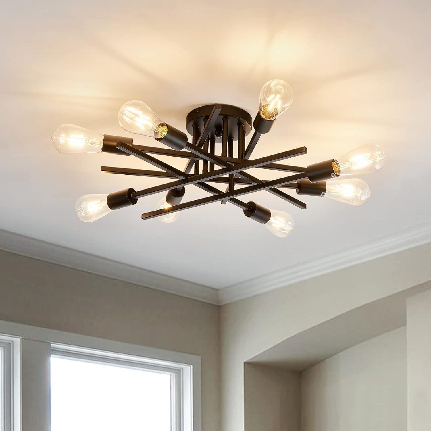 8 Light Matte Black Sputnik Chandelier Semi Flush Mount illuminating a modern interior space with stylish design.