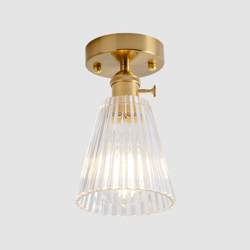 Industrial Chic Meets Modern Versatility: The Clear Glass Single-Light Gold Ceiling Light