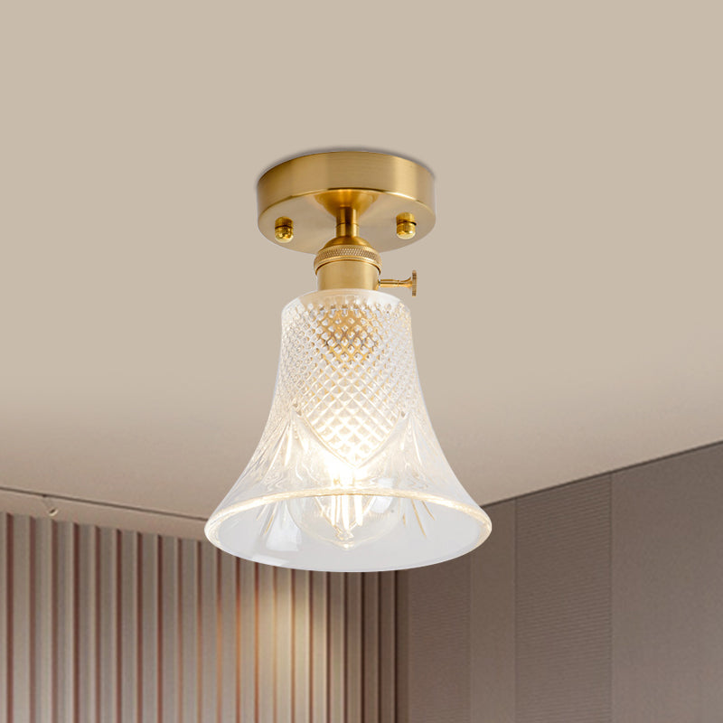Industrial Chic Meets Modern Versatility: The Clear Glass Single-Light Gold Ceiling Light