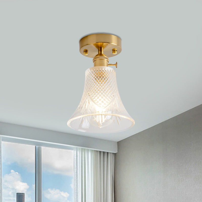 Industrial Chic Meets Modern Versatility: The Clear Glass Single-Light Gold Ceiling Light