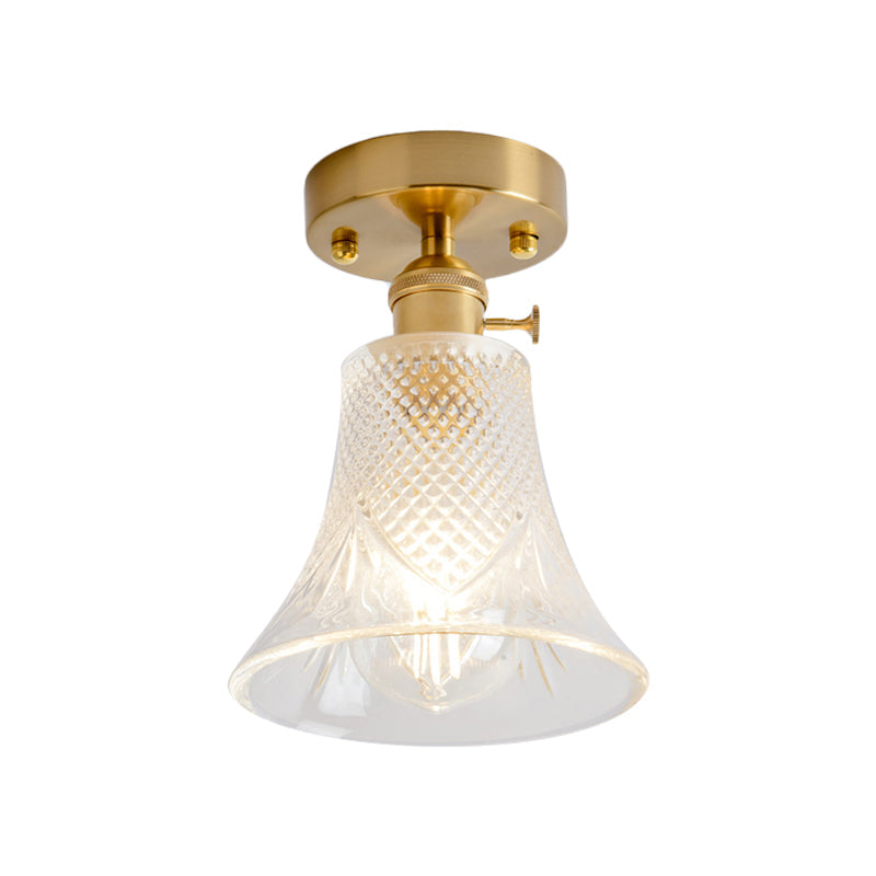 Industrial Chic Meets Modern Versatility: The Clear Glass Single-Light Gold Ceiling Light