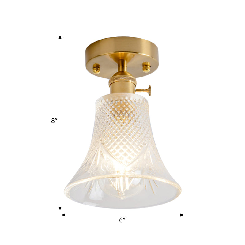 Industrial Chic Meets Modern Versatility: The Clear Glass Single-Light Gold Ceiling Light