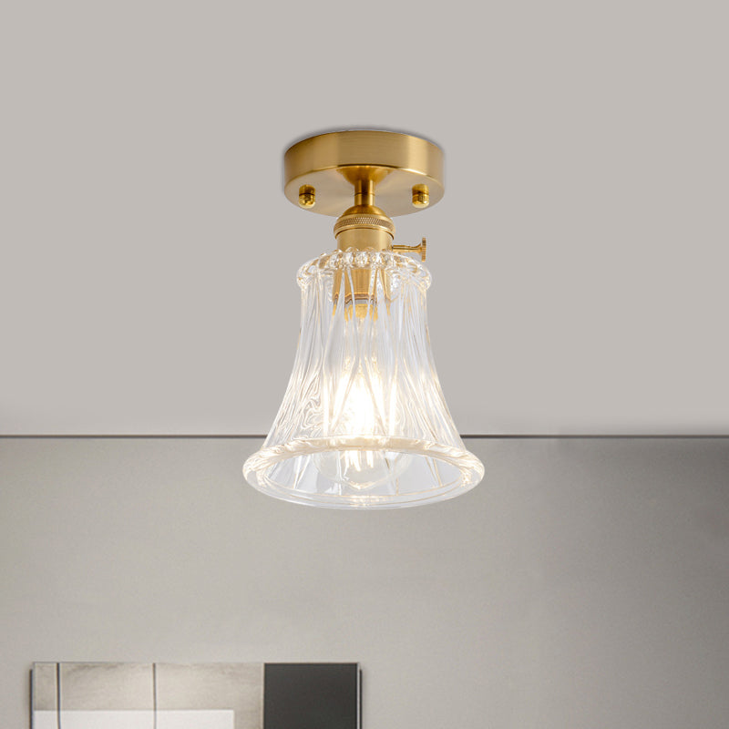 Industrial Chic Meets Modern Versatility: The Clear Glass Single-Light Gold Ceiling Light