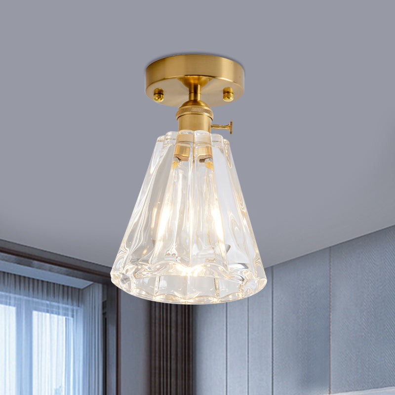 Industrial Chic Meets Modern Versatility: The Clear Glass Single-Light Gold Ceiling Light