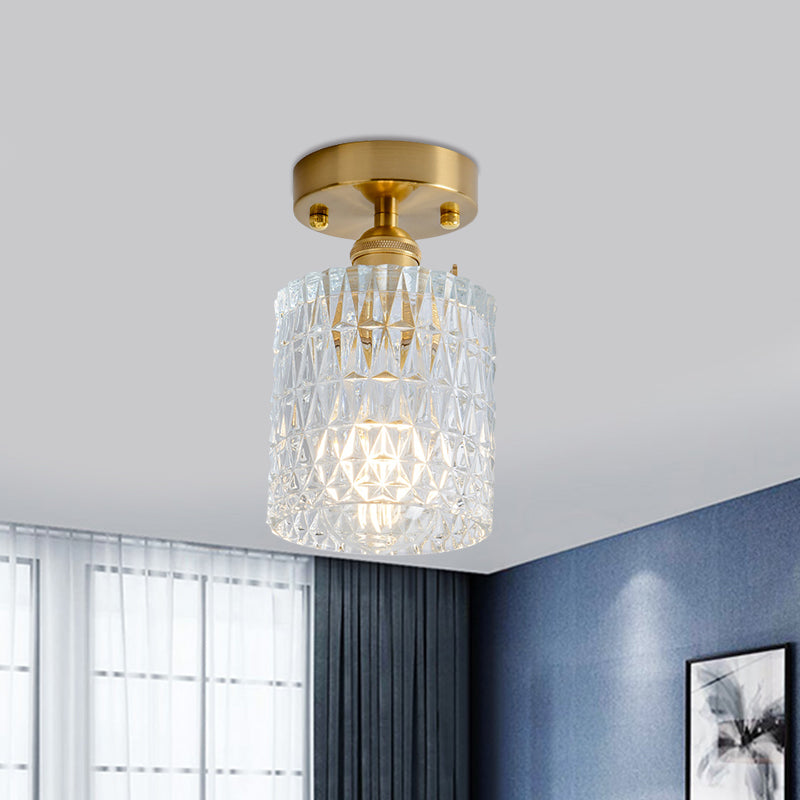 Industrial Chic Meets Modern Versatility: The Clear Glass Single-Light Gold Ceiling Light