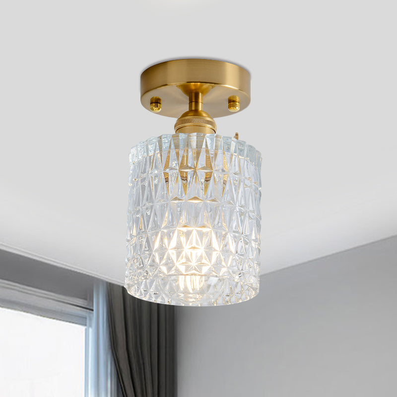 Industrial Chic Meets Modern Versatility: The Clear Glass Single-Light Gold Ceiling Light