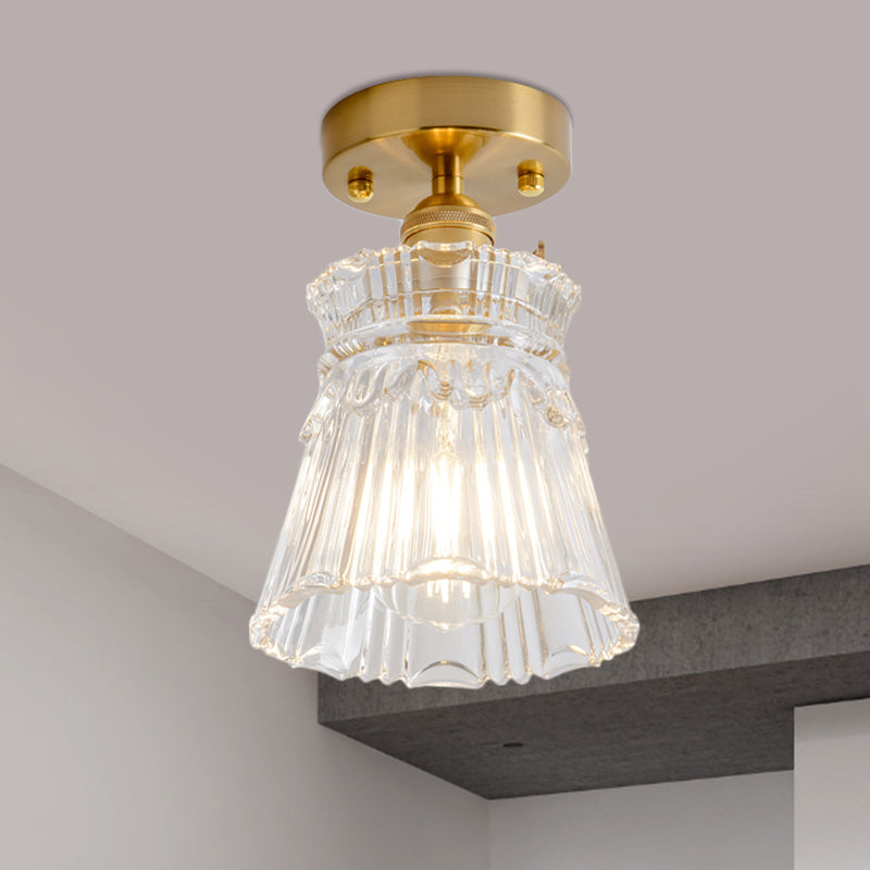 Industrial Chic Meets Modern Versatility: The Clear Glass Single-Light Gold Ceiling Light