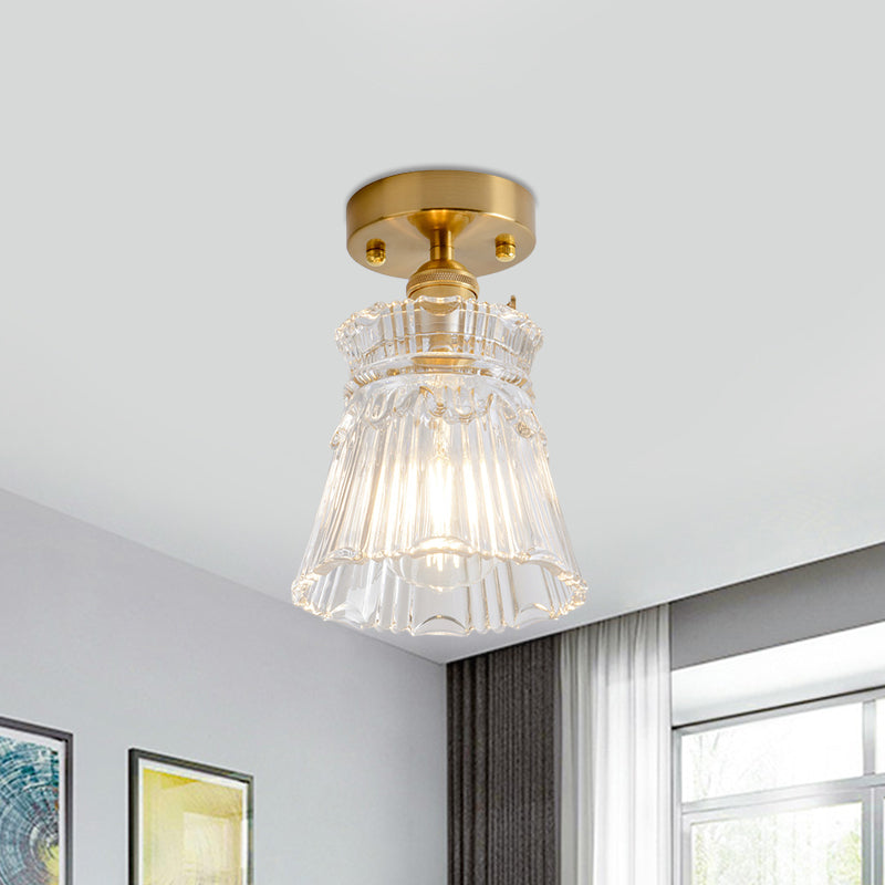 Industrial Chic Meets Modern Versatility: The Clear Glass Single-Light Gold Ceiling Light