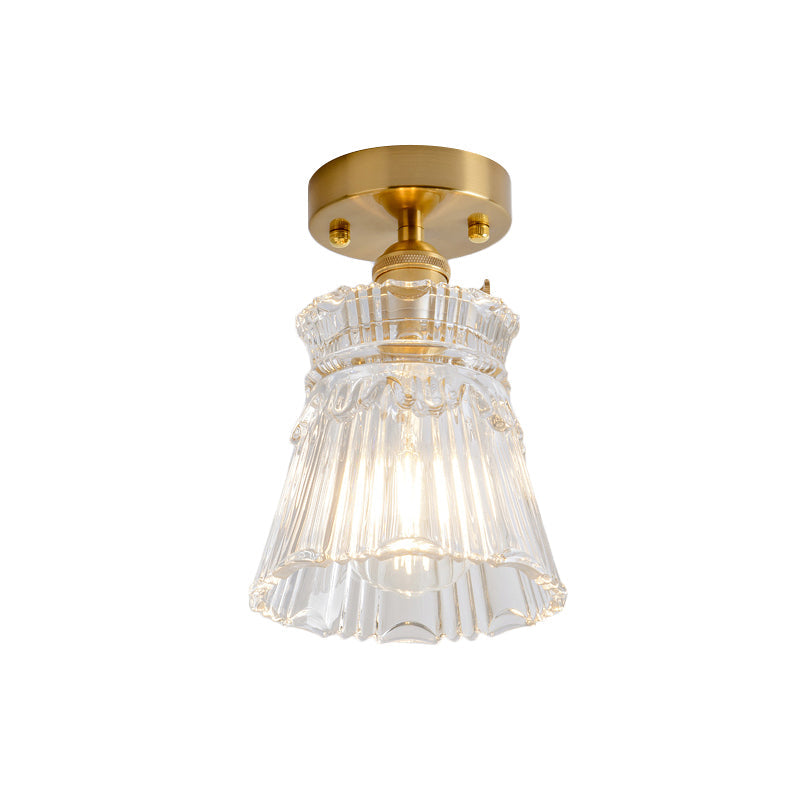 Industrial Chic Meets Modern Versatility: The Clear Glass Single-Light Gold Ceiling Light