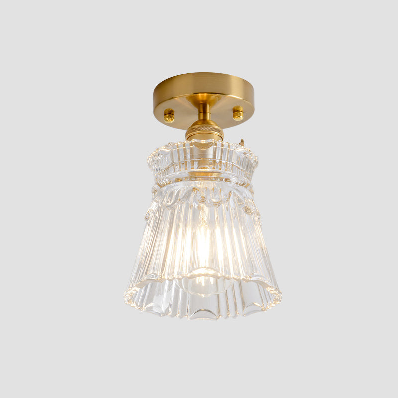 Industrial Chic Meets Modern Versatility: The Clear Glass Single-Light Gold Ceiling Light