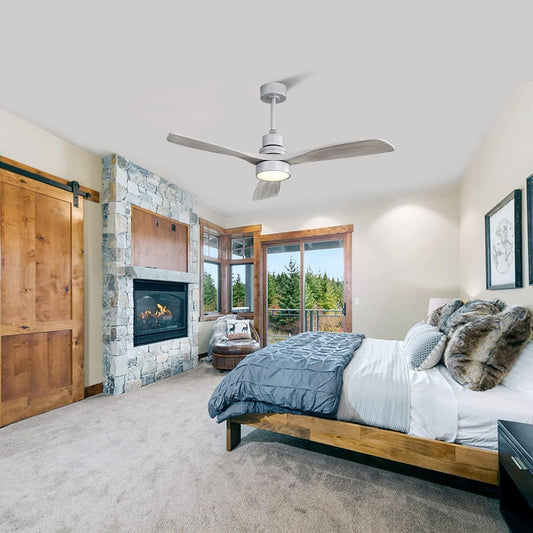 52 Inch Ceiling Fan With Lights Remote Quiet DC Motor in a stylish bedroom setting with a cozy fireplace.
