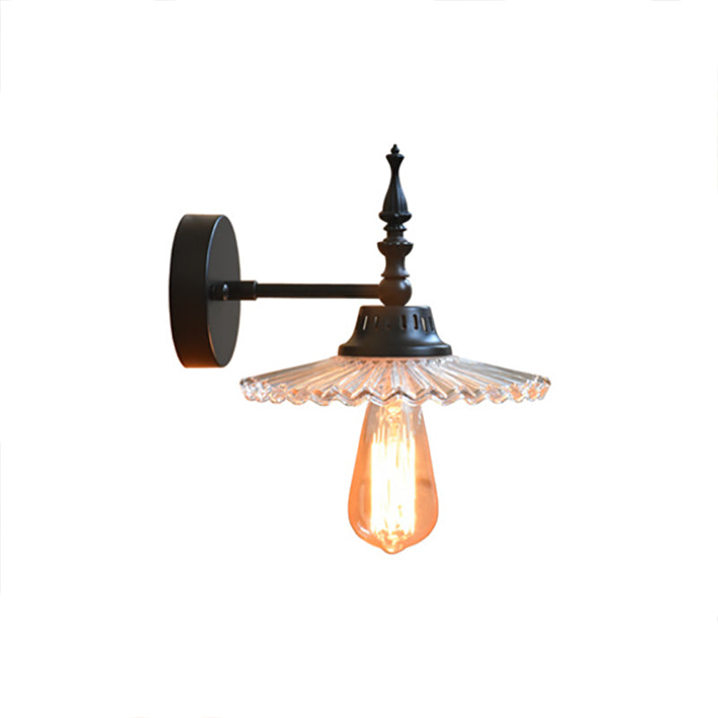 Light Up Your Space with Industrial Chic: The 1-Light Black Sconce with Clear/Green Glass