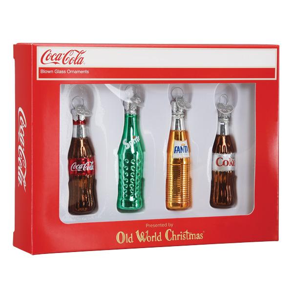 Set of Coca-Cola and Fanta bottle-shaped ornaments in a box, featuring Old World Christmas branding.