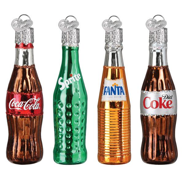 Set of four soda bottle-shaped ornaments with different brands on a white background