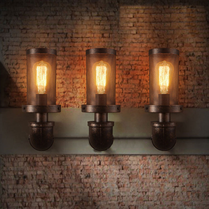 Enliven Your Walls with Industrial Flair: The Black Mesh Cylinder Wall Sconce