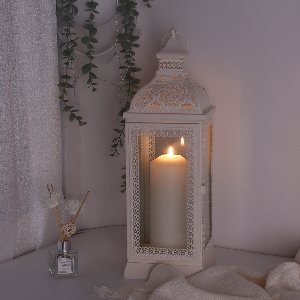 Rustic Metal Decorative Candle Lantern Hanging Candle Holder with Tempered Glass White on a cozy table with a candle inside
