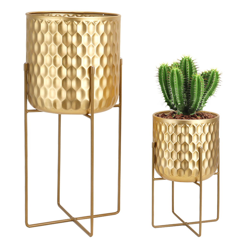 2 Set of 17&12 Inch Tall Planters With Stand Gold showcasing stylish honeycomb design with plants.