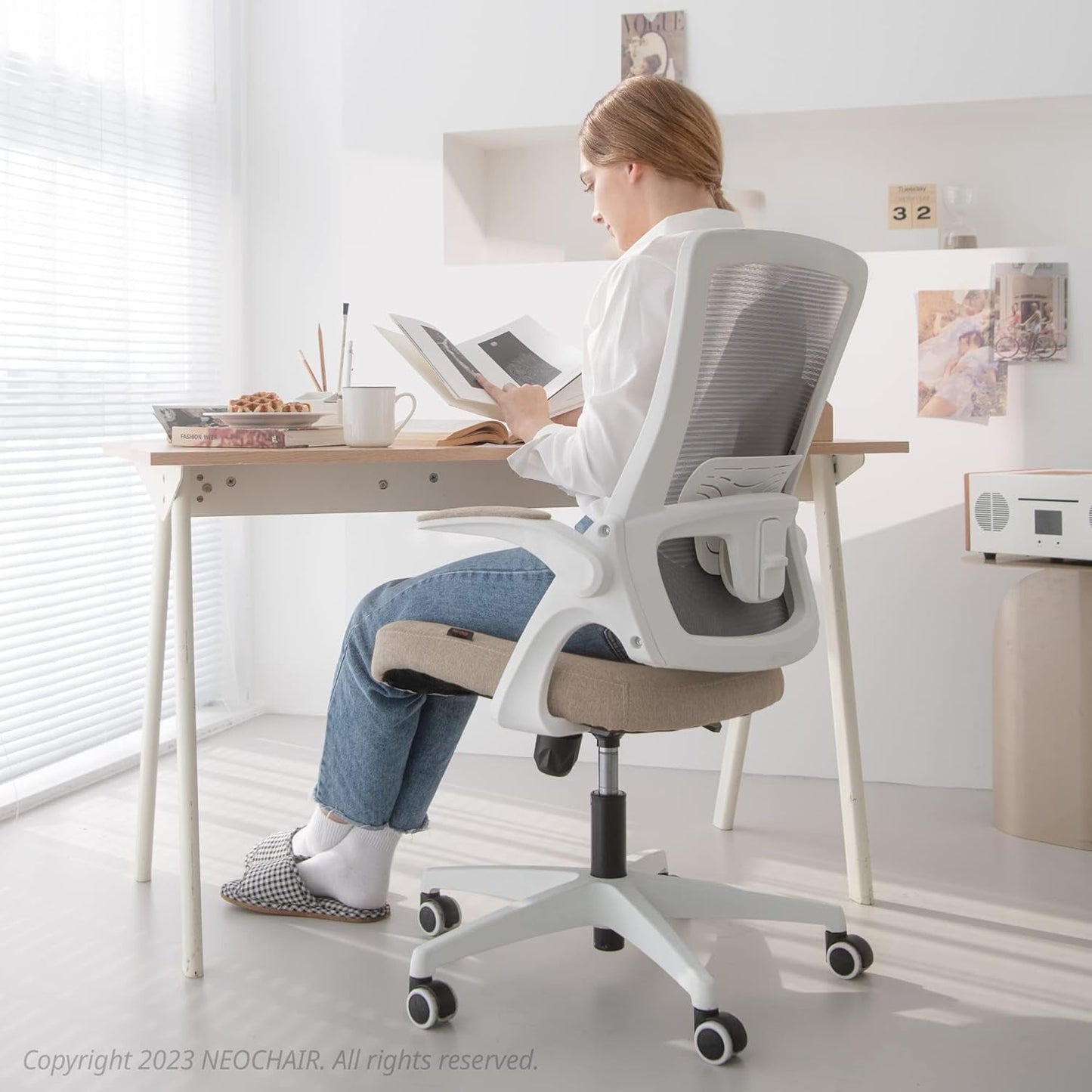 Beige High Back Mesh Office Chair With Adjustable Height And Ergonomic Design