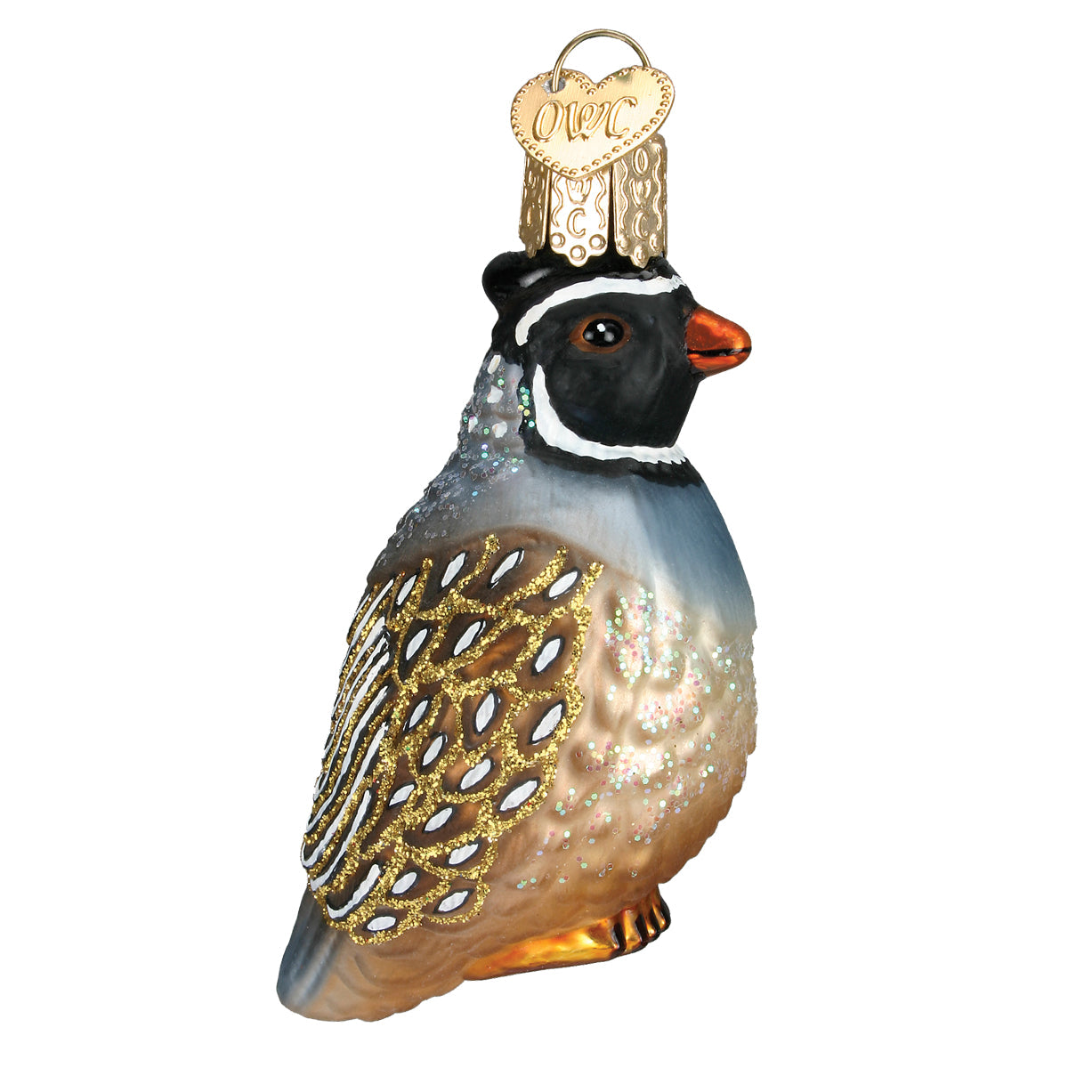 Glass ornament of a partridge with gold detailing on a white background