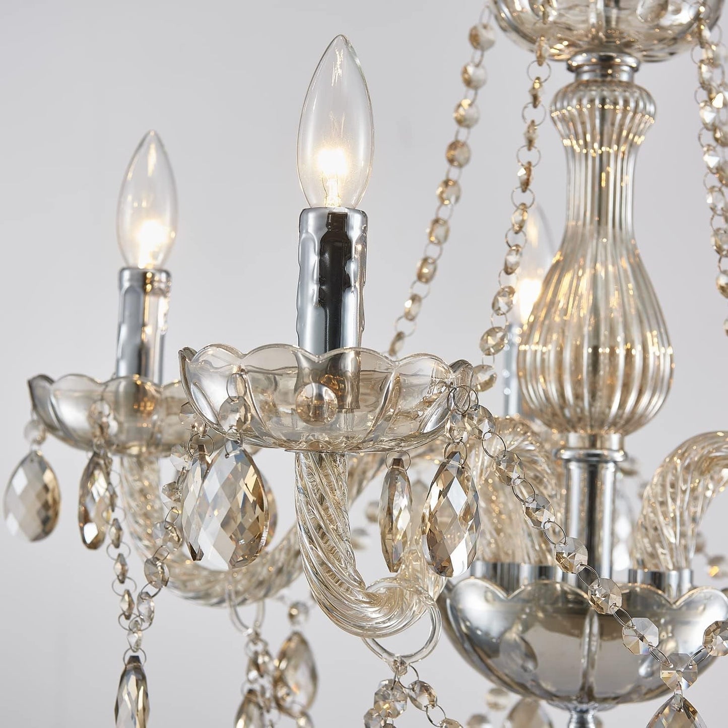 Close-up of a Champagne Crystal Chandelier 5 Light Modern Bedroom featuring elegant glass arms and crystal accents.