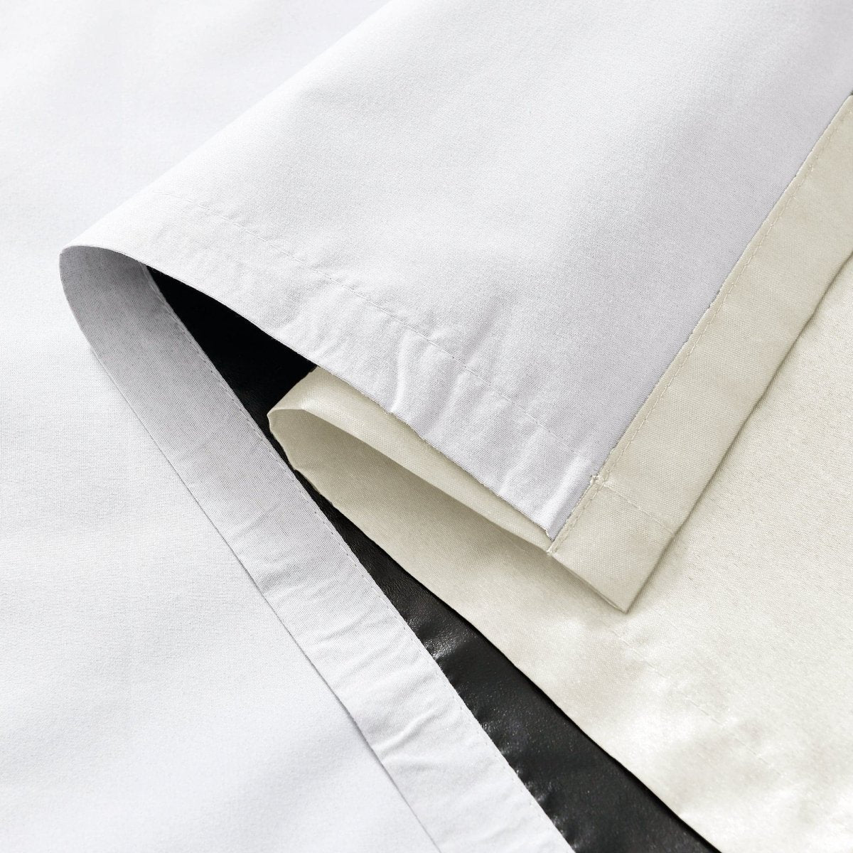 Close-up of Faux Silk 100% Blackout Window Curtain showcasing its smooth texture and multi-layer design.