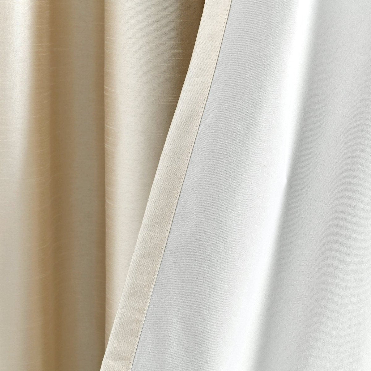 Faux Silk 100% Blackout Window Curtain showcasing smooth texture and solid colors for luxurious living spaces.
