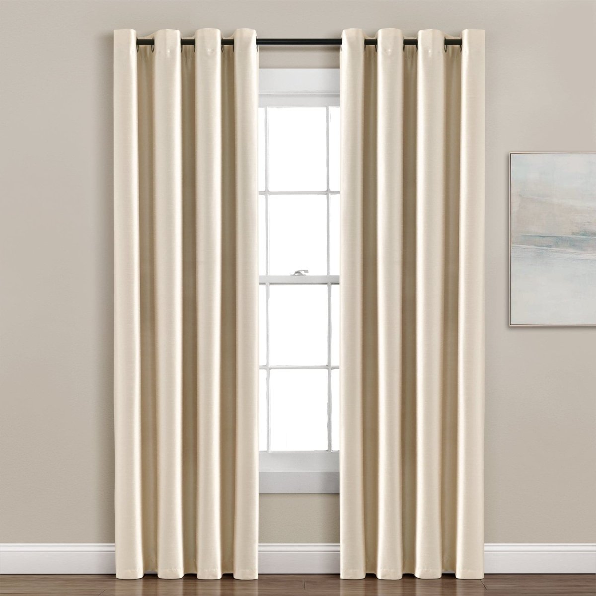 Faux Silk 100% Blackout Window Curtain panels in a modern living room setting, offering complete privacy and a luxurious look.