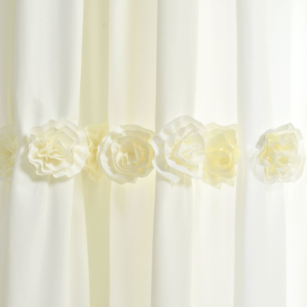 Darla Window Curtain featuring elegant handcrafted flower embellishments in a romantic white design.
