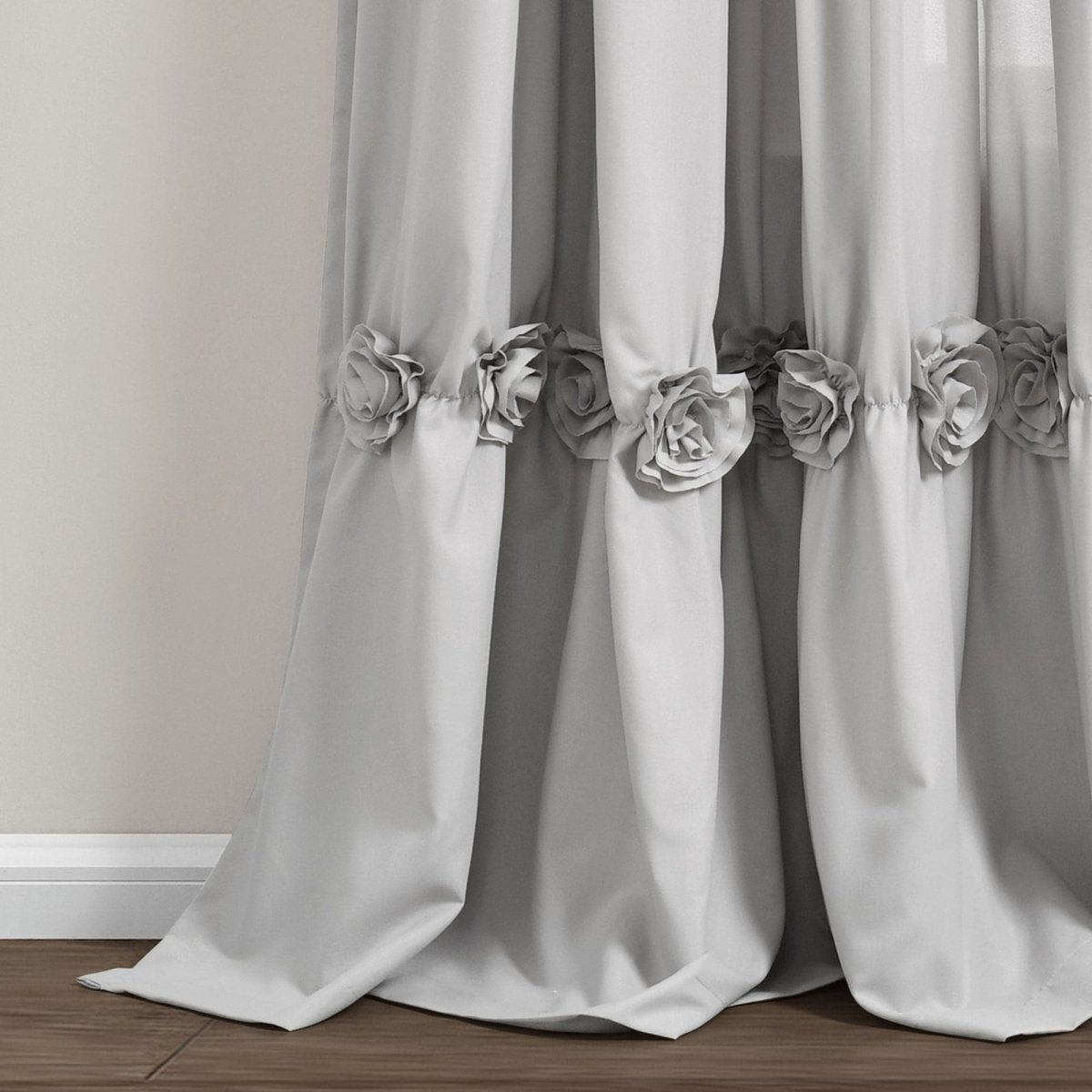 Darla Window Curtain featuring handcrafted flower embellishments in a light gray color, adding elegance to any room.