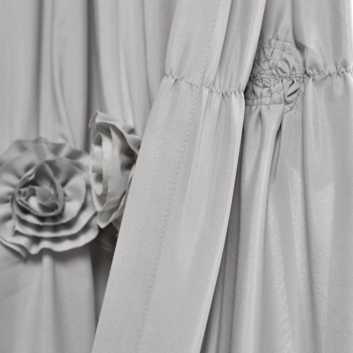 Darla Window Curtain fabric detail showcasing flower embellishments and elegant drapery style.