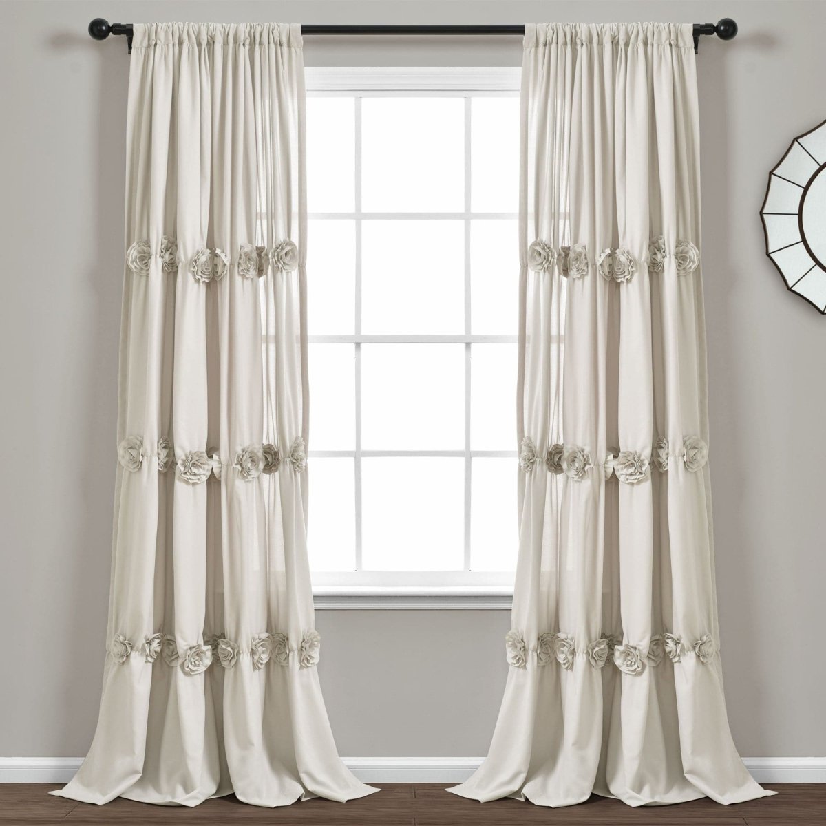 Darla Window Curtain features handcrafted flower embellishments for a romantic shabby chic look.