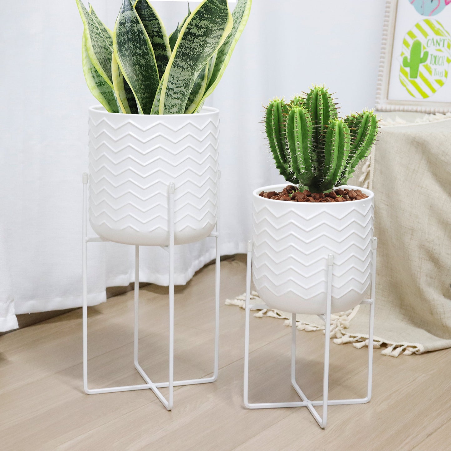Set of 2 Planters With Stand 17&12 Tall Flower Pots Bright White with plants in each planter.
