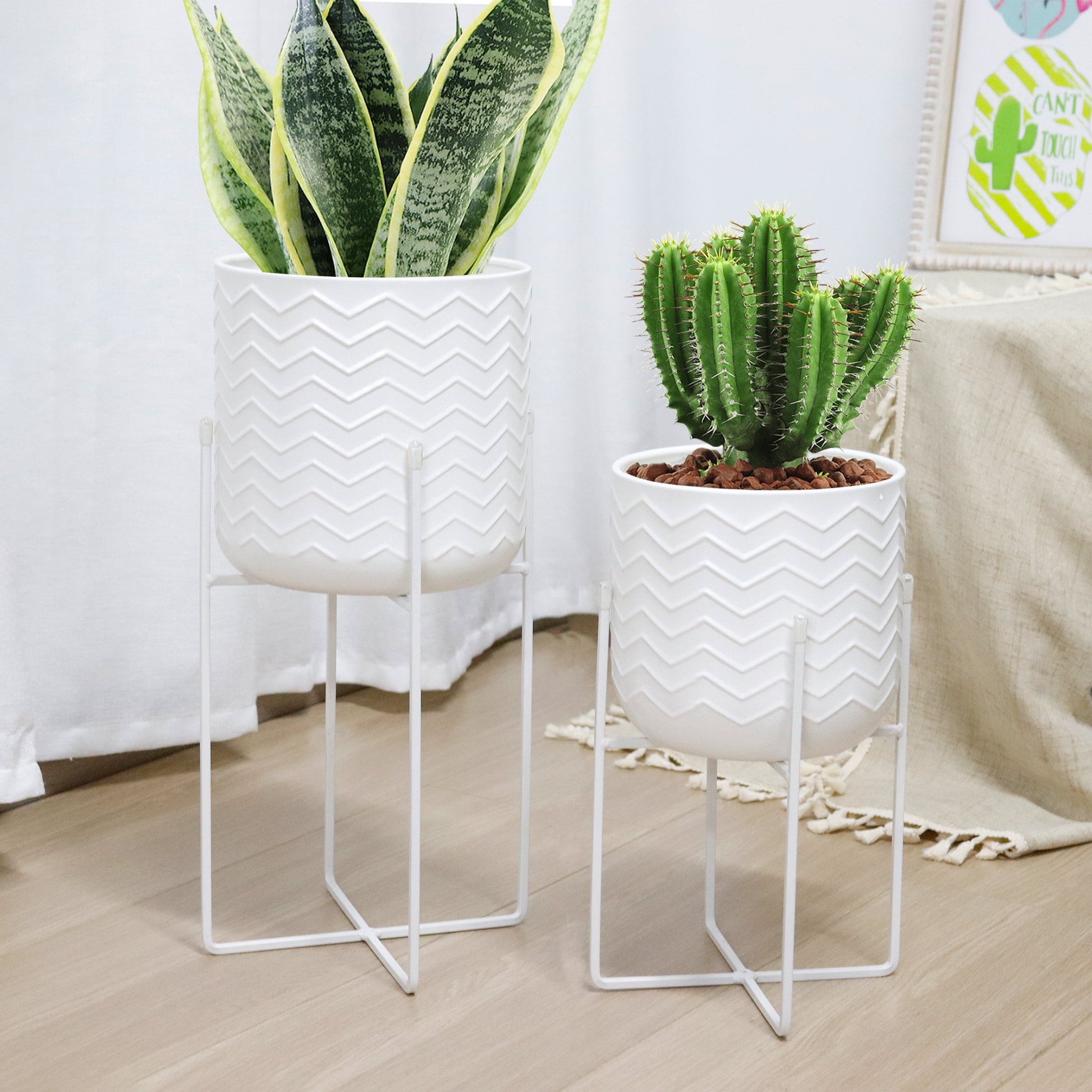 Set of 2 Planters With Stand 17&12 Tall Flower Pots Bright White with plants in each planter.