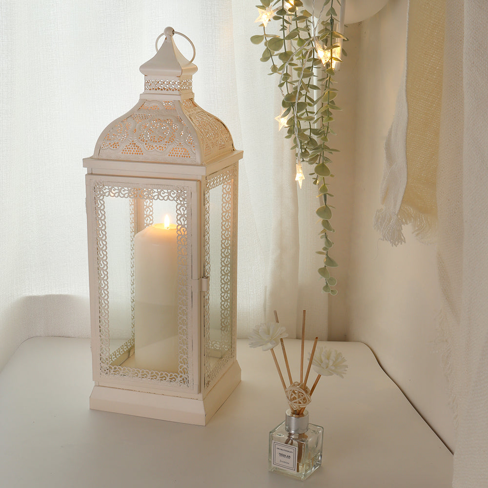 Rustic Metal Decorative Candle Lantern Hanging Candle Holder with Tempered Glass White illuminating a stylish interior.