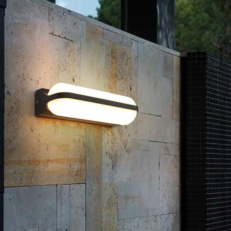 Sloane Modern Glow: Black Capsule Wall Sconce