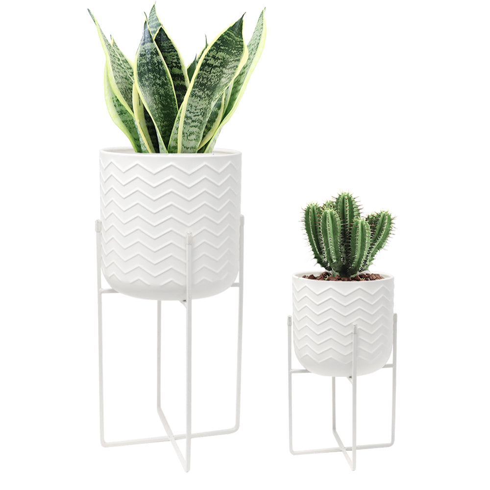 Set of 2 Planters With Stand 17&12 Tall Flower Pots Bright White with decorative plants.