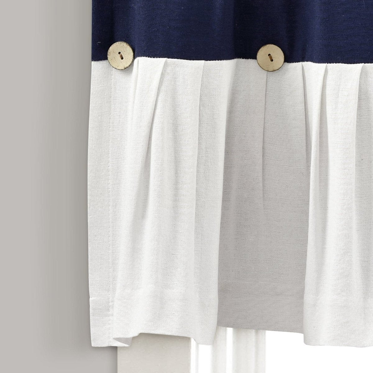 Close-up of Linen Button Valance showcasing pleats and buttons with color blocking in navy and white.
