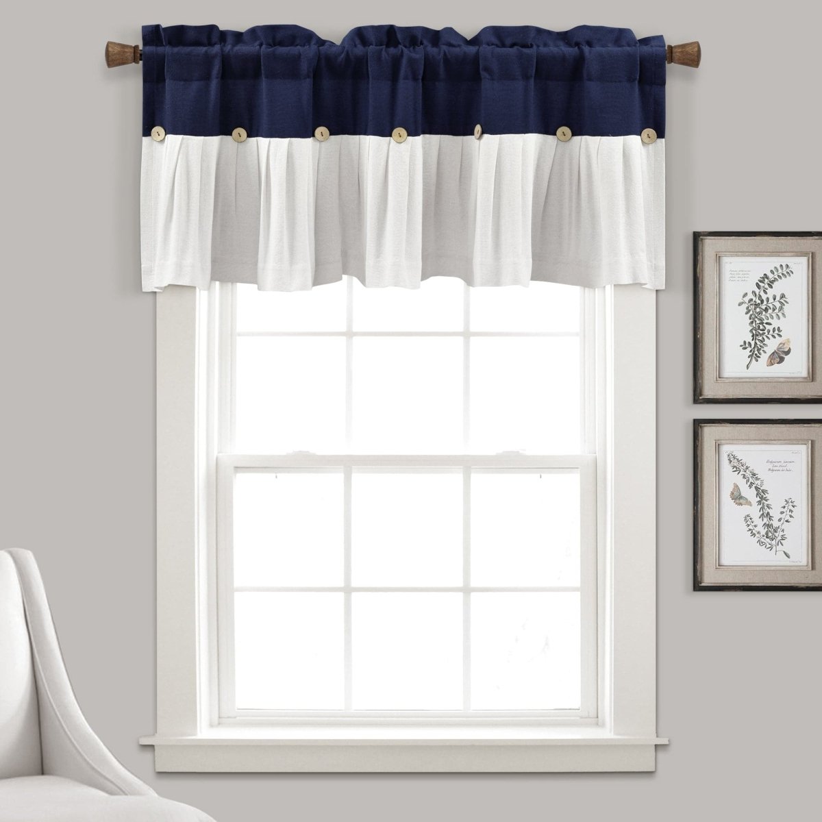 Linen Button Valance in navy and white color blocking adds farmhouse elegance to a window, featuring pleats and buttons.