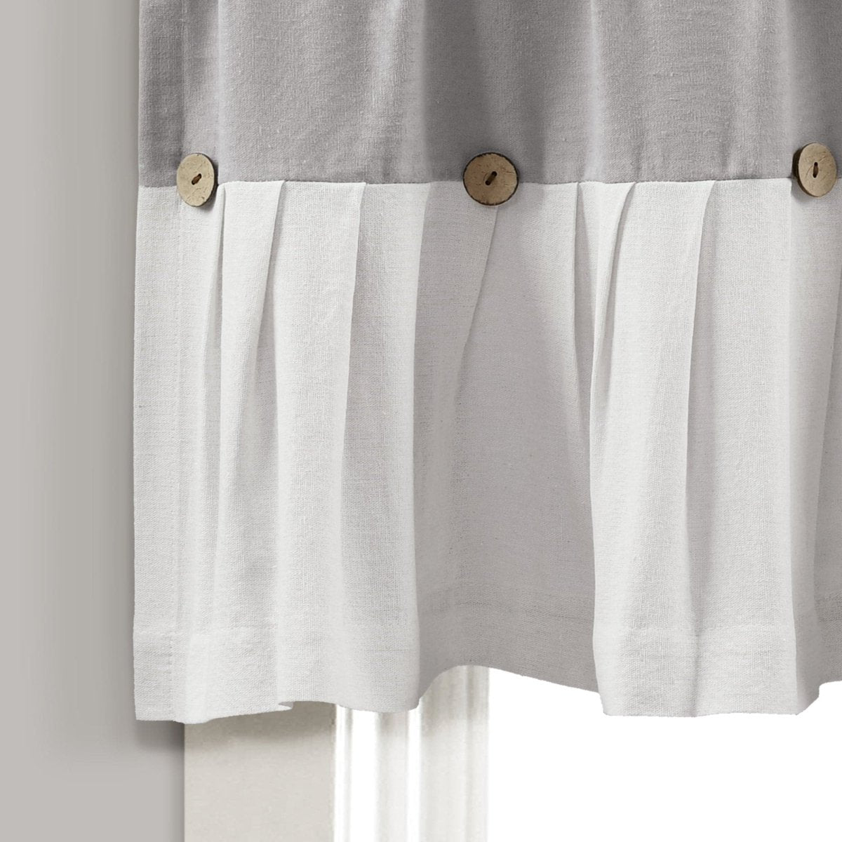 Detail of Linen Button Valance featuring pleats and wooden buttons for a farmhouse chic look.