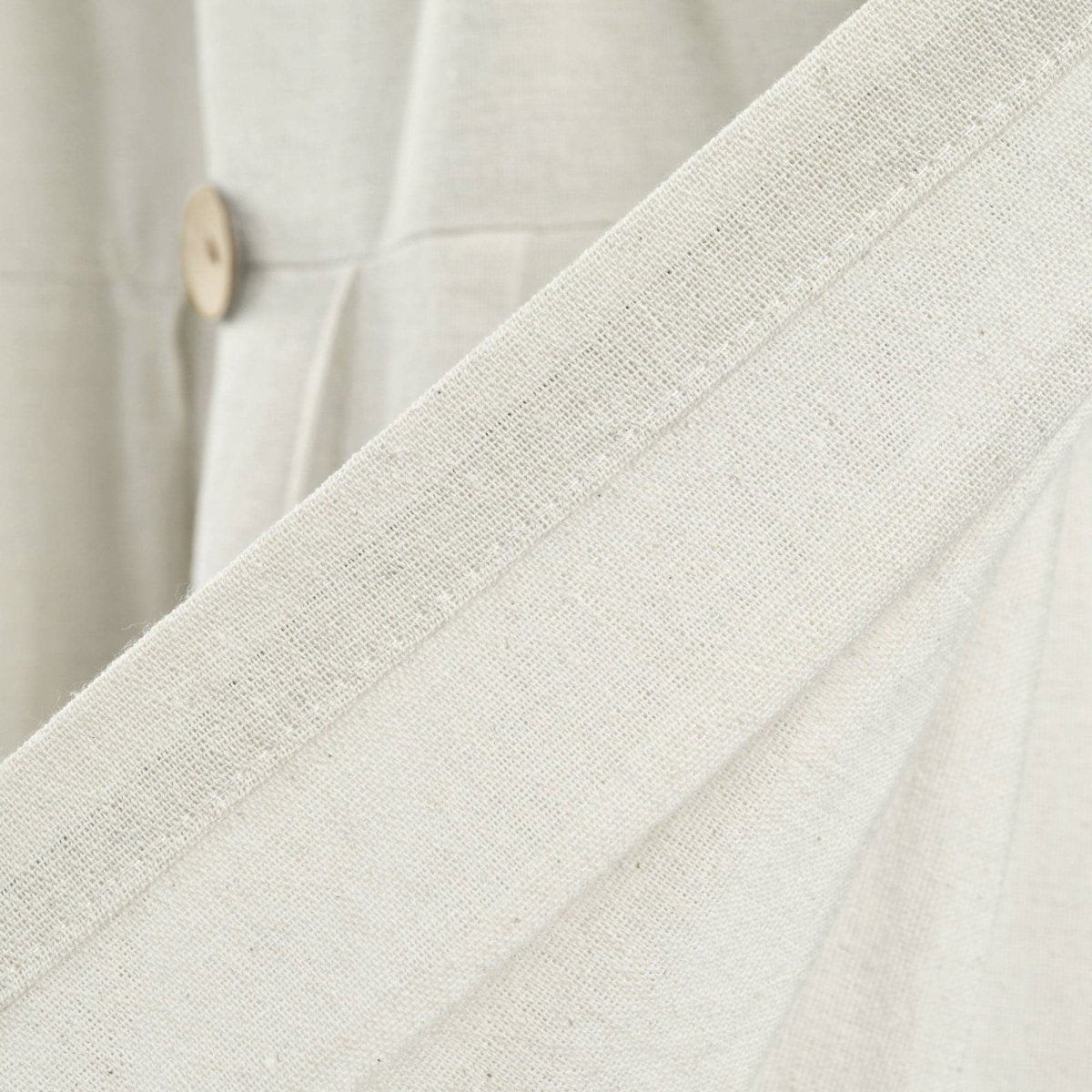 Close-up of the fabric texture and button detail of the Linen Button Valance with a natural, elegant finish.