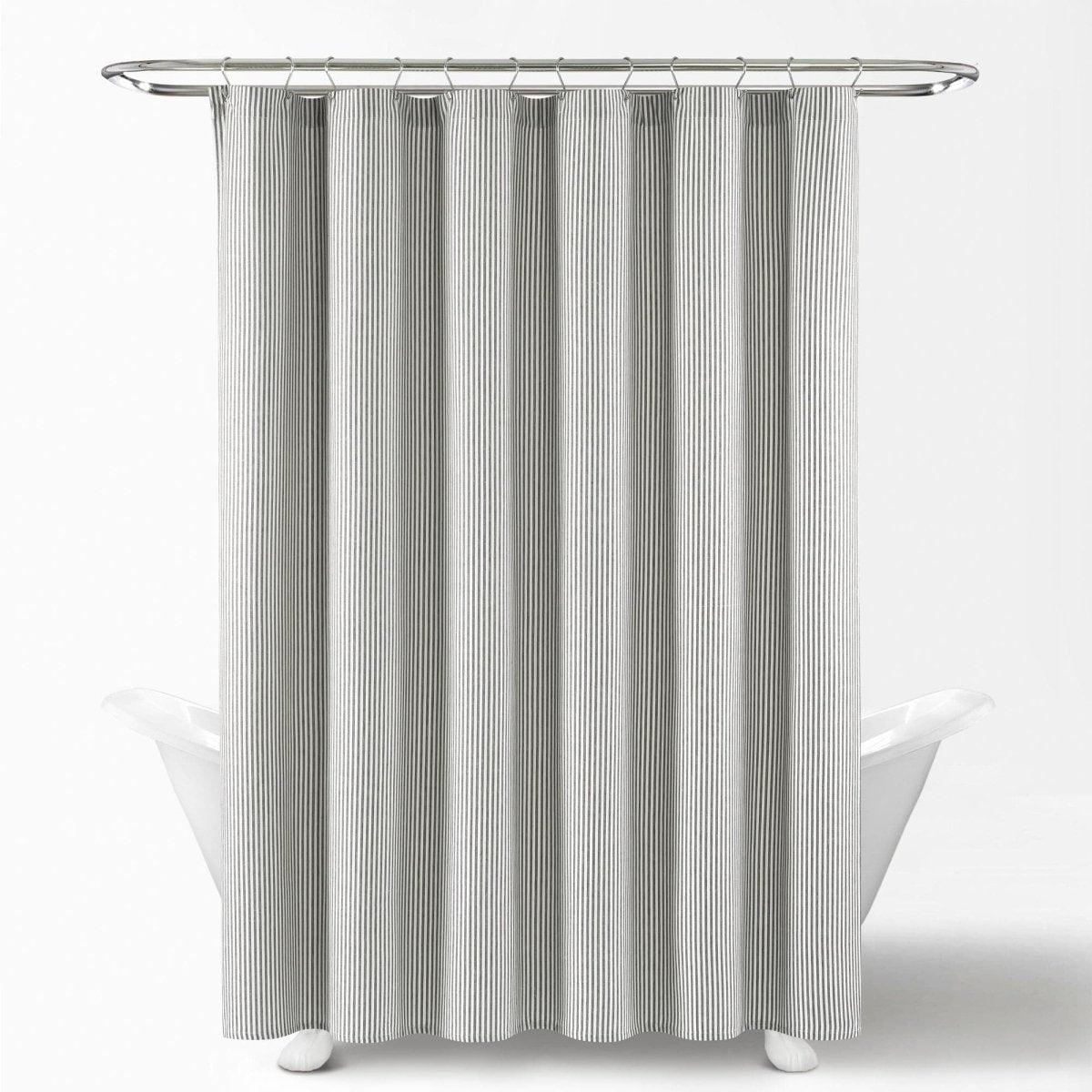 Farmhouse Vintage Stripe Yarn Dyed Recycled Cotton Blend Shower Curtain hanging in a bathtub setting.