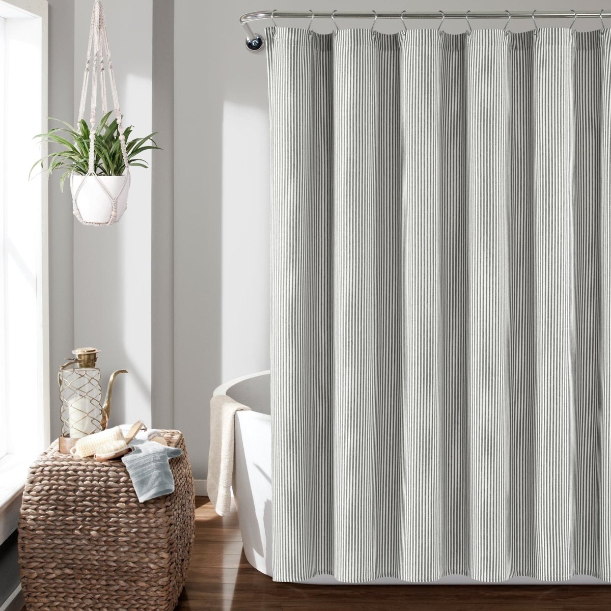 Farmhouse Vintage Stripe Yarn Dyed Recycled Cotton Blend Shower Curtain hanging in a bright bathroom setting.