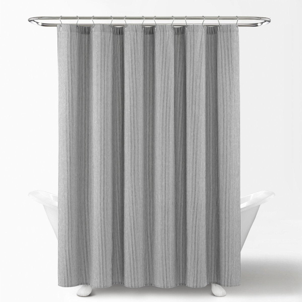 Farmhouse Vintage Stripe Yarn Dyed Recycled Cotton Blend Shower Curtain hanging in a white bathtub.