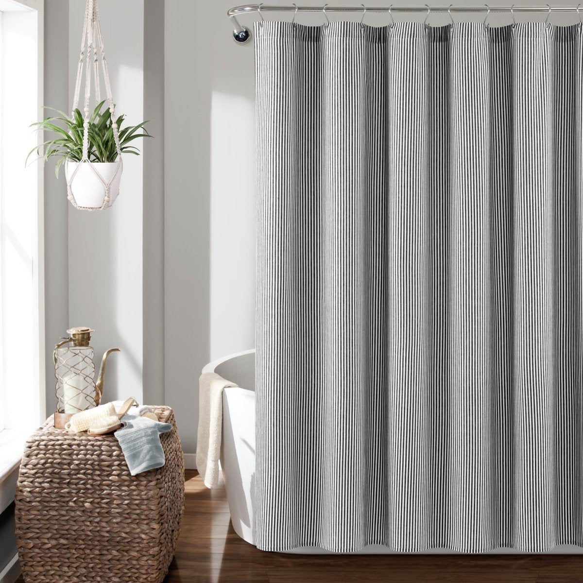 Farmhouse Vintage Stripe Yarn Dyed Recycled Cotton Blend Shower Curtain hanging in a stylish bathroom setting.