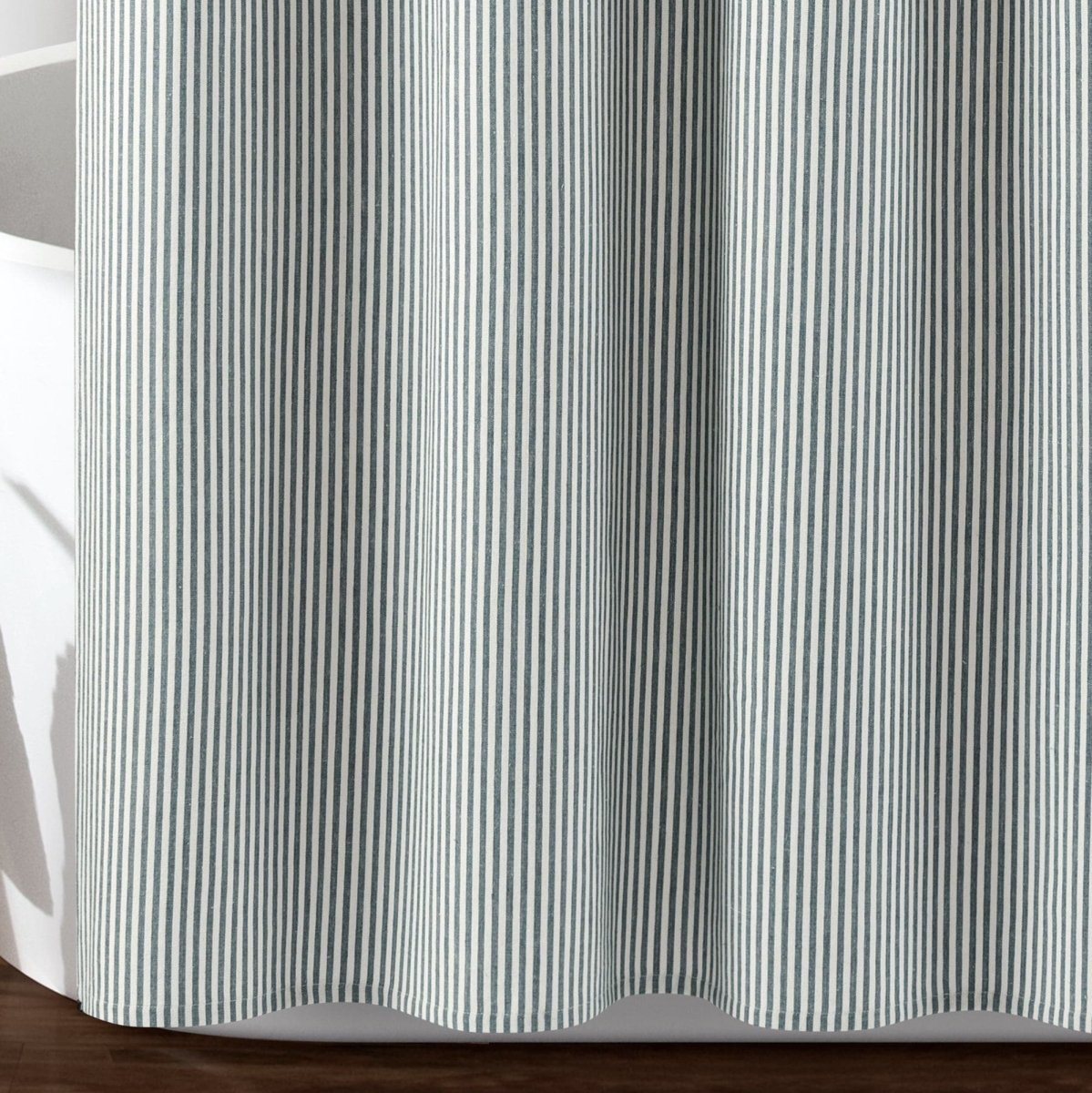 Farmhouse Vintage Stripe Yarn Dyed Recycled Cotton Blend Shower Curtain in soft blue and white stripes.