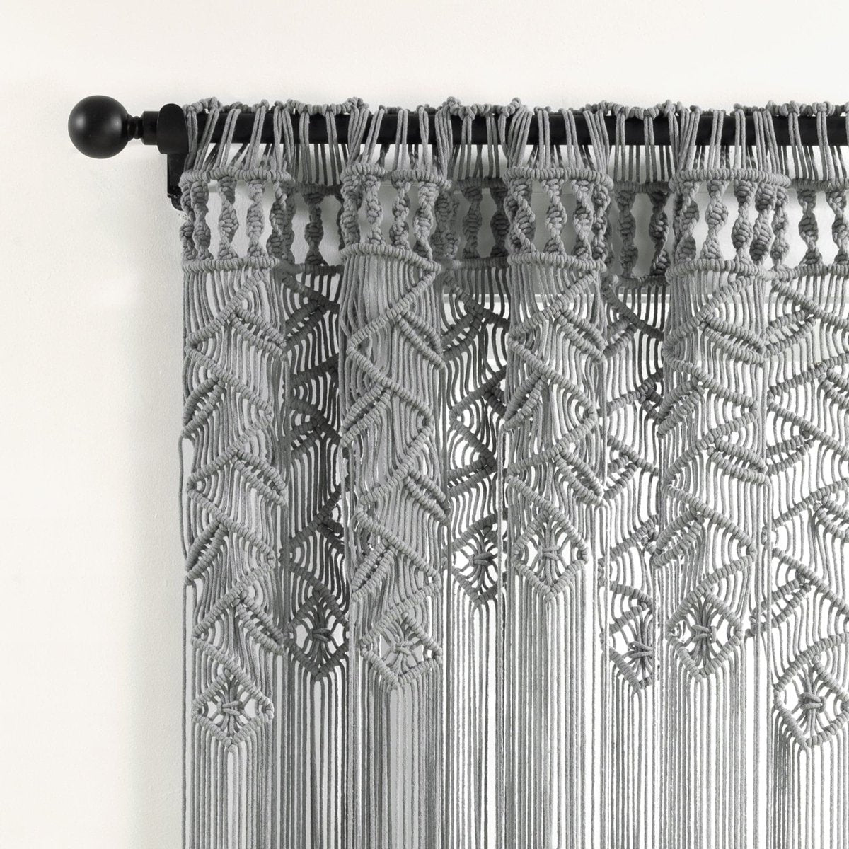 Boho Macrame Leaf Cotton Window Curtain showcasing intricate knot design and flowy fringe in a stylish gray color.