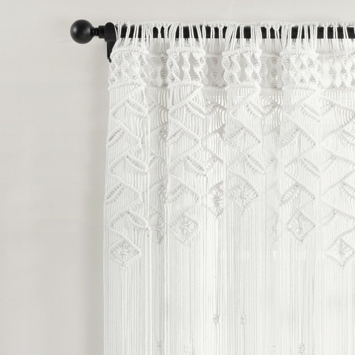 Boho Macrame Leaf Cotton Window Curtain featuring intricate macrame design and flowy fringe detail.